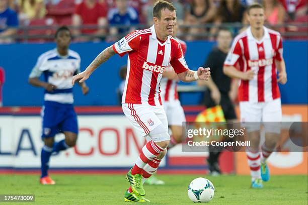 Glenn Whelan of Stoke City controls the ball against FC Dallas on July 27, 2013 at FC Dallas Stadium in Frisco, Texas.