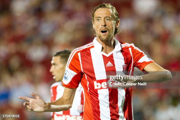 Peter Crouch of Stoke City has words with his teammates against FC Dallas on July 27, 2013 at FC Dallas Stadium in Frisco, Texas.