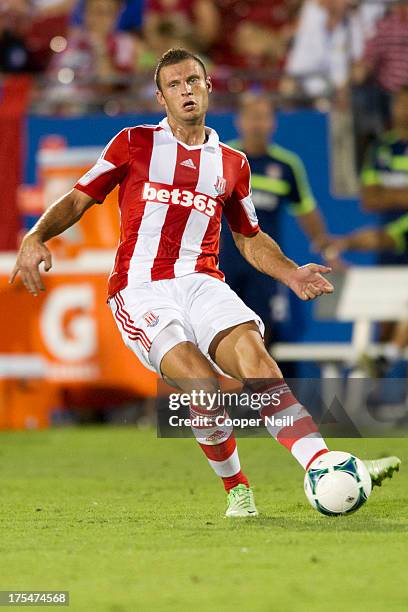 Erik Pieters of Stoke City brings the ball up field against FC Dallas on July 27, 2013 at FC Dallas Stadium in Frisco, Texas.