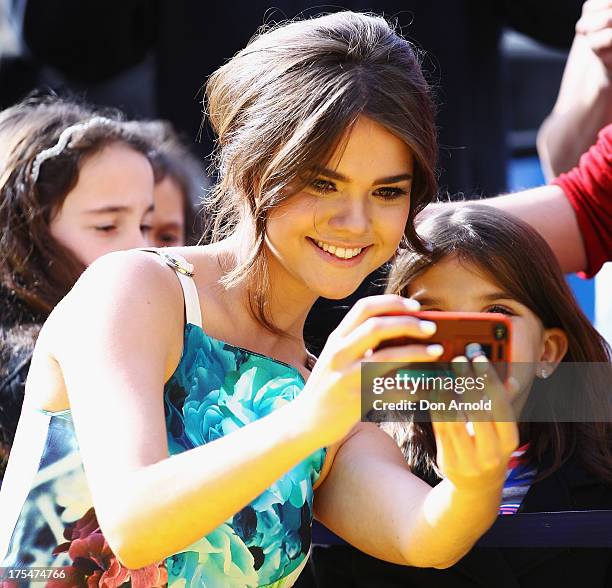 Maia Mitchell greets fans during the Australian premiere of The Disney Channel's "Teen Beach Movie" on August 4, 2013 in Sydney, Australia.