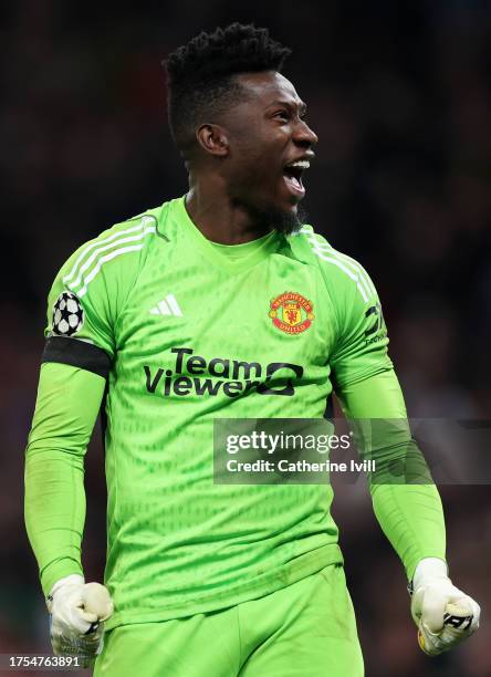 Andre Onana of Manchester United celebrates after saving a penalty from Jordan Larsson of FC Copenhagen during the UEFA Champions League match...