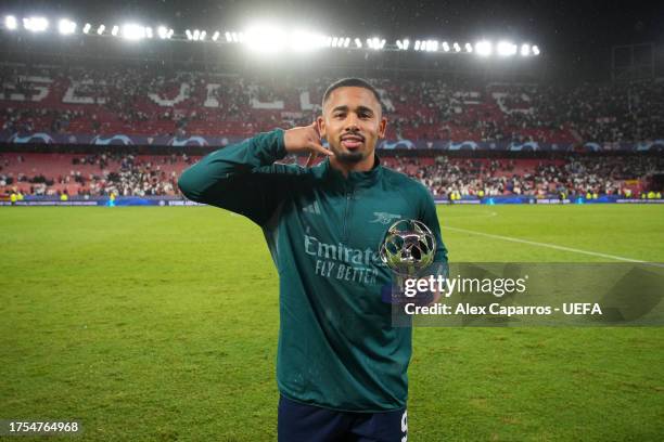 Gabriel Jesus of Arsenal poses for a photo with the PlayStation Player Of The Match award after the team's victory during the UEFA Champions League...