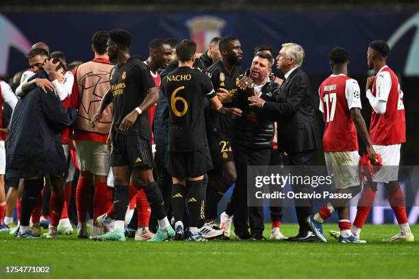 Antonio Ruediger reacts alongside Head Coach Carlo Ancelotti following the UEFA Champions League match between SC Braga and Real Madrid at Estadio...