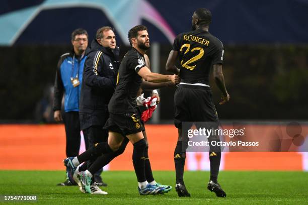 Antonio Ruediger reacts alongside teammate Nacho Fernandez following the UEFA Champions League match between SC Braga and Real Madrid at Estadio...