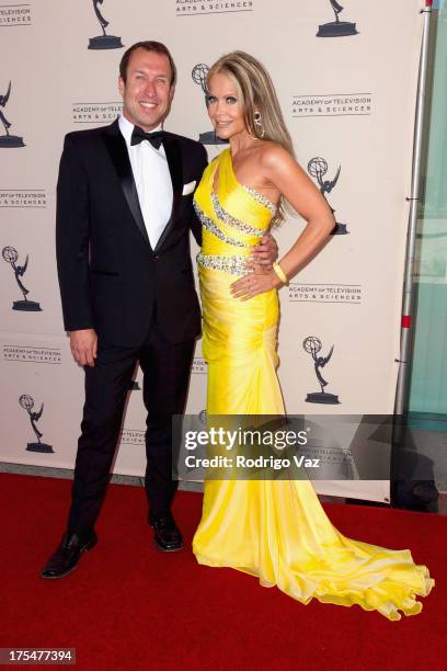 Hosts Joseph McDonald and Tamara Henry arrive at the Academy of Television Arts & Sciences 65th Los Angeles Area Emmy Awards at Leonard H. Goldenson...