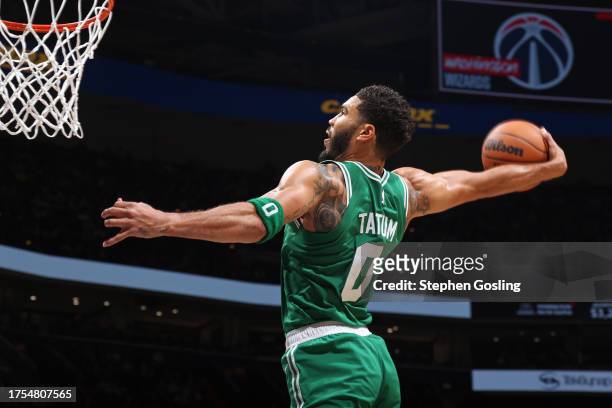 Jayson Tatum of the Boston Celtics dunks the ball during the game against the Washington Wizards on October 30, 2023 at Capital One Arena in...