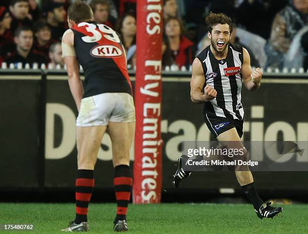 Jarryd Blair of the Magpies celebrates a goal during the round 19 AFL match between the Collingwood Magpies and the Essendon Bombers at Melbourne...