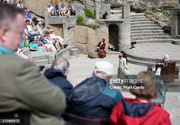 The audience take their seats as they watch Wuthering Heights presented by Ilkley Playhouse at the Minack Theatre on August 2, 2013 in Porthcurno,...