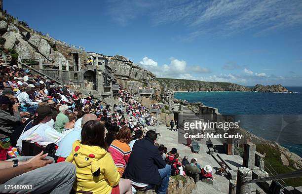 The audience take their seats as they watch Wuthering Heights presented by Ilkley Playhouse at the Minack Theatre on August 2, 2013 in Porthcurno,...