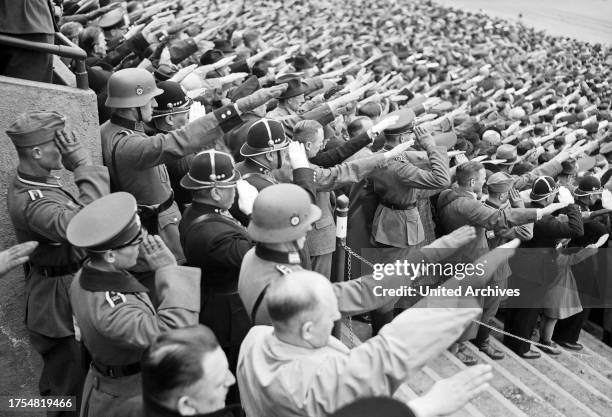 Prague, April 20 at Sokol stadium. With black helmet Czech police. 1930s.