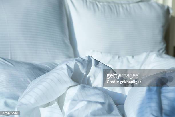 unmade bed - duvet stock pictures, royalty-free photos & images