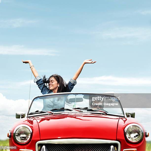 happy young people in a cabriolet - convertible stock pictures, royalty-free photos & images