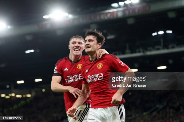Harry Maguire of Manchester United celebrates after scoring the team's first goal during the UEFA Champions League match between Manchester United...