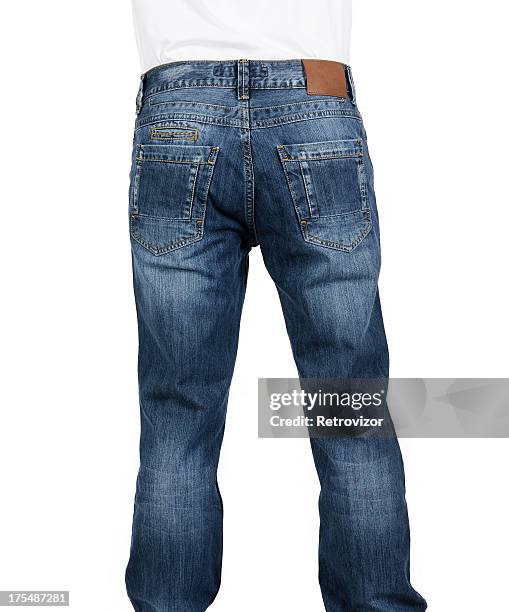 rear view of a man wearing blue jeans with a blank label - denim stockfoto's en -beelden