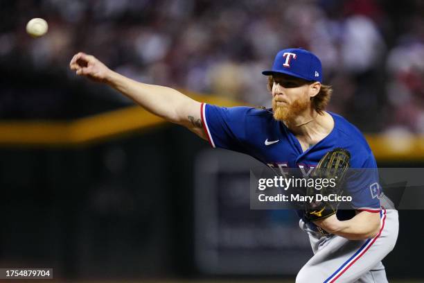 Jon Gray of the Texas Rangers pitches during Game 3 of the 2023 World Series between the Texas Rangers and the Arizona Diamondbacks at Chase Field on...