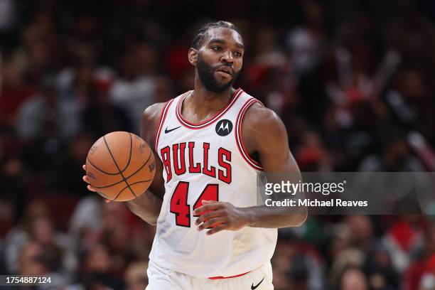 Patrick Williams of the Chicago Bulls dribbles up the court against the Minnesota Timberwolves during a preseason game at the United Center on...
