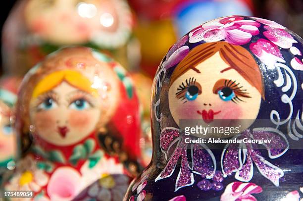 hand painted babushka or matryoshka russian nesting dolls - russian nesting doll stock pictures, royalty-free photos & images