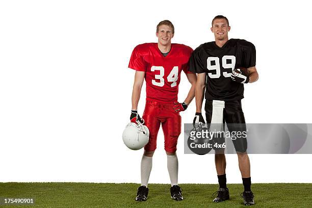 two football players - american football player isolated stock pictures, royalty-free photos & images