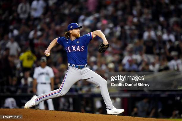 Jon Gray of the Texas Rangers pitches during Game 3 of the 2023 World Series between the Texas Rangers and the Arizona Diamondbacks at Chase Field on...