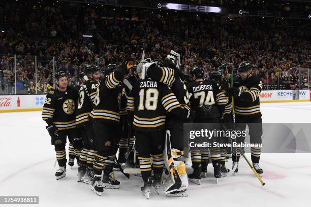 The Boston Bruins celebrate the win against the Florida Panthers on October 30, 2023 at the TD Garden in Boston, Massachusetts.