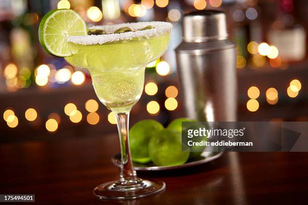 margarita at a bar - tequila drink stock pictures, royalty-free photos & images