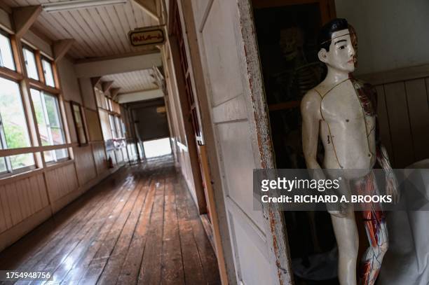 This photo taken on September 20, 2023 shows an old human body model in a classroom at the former Ashigakubo Elementary School in the town of Yokose,...
