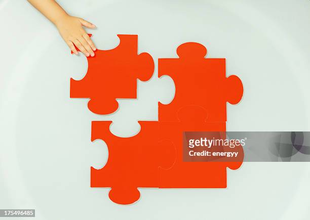 problem solved - 4 puzzle pieces stock pictures, royalty-free photos & images