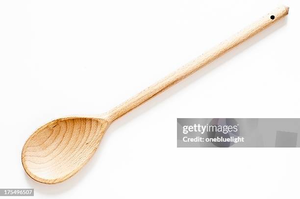 wooden spoon on white background - wooden spoon stock pictures, royalty-free photos & images