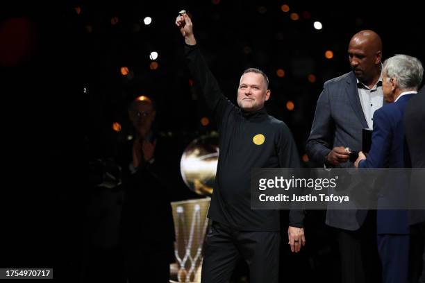 Denver Nuggets head coach Michael Malone receives his championship ring before the game against the Los Angeles Lakers at Ball Arena on October 24,...