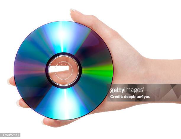 hand holding blank blue ray disk on white - blu raydisk stockfoto's en -beelden