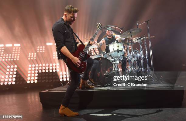 Mike Kerr and Ben Thatcher of Royal Blood perform on stage at the Eventim Apollo on October 24, 2023 in London, England.
