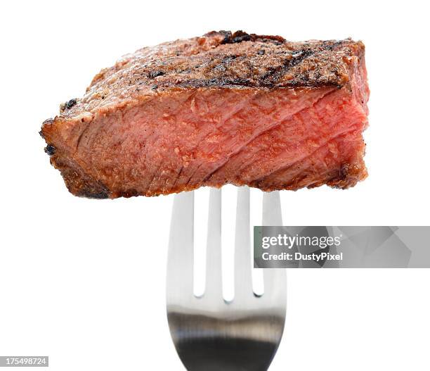 steak bite - meat fork stock pictures, royalty-free photos & images
