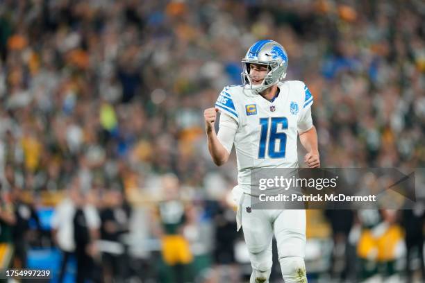 Jared Goff of the Detroit Lions celebrates a touchdown against the Green Bay Packers during the second quarter in the game at Lambeau Field on...