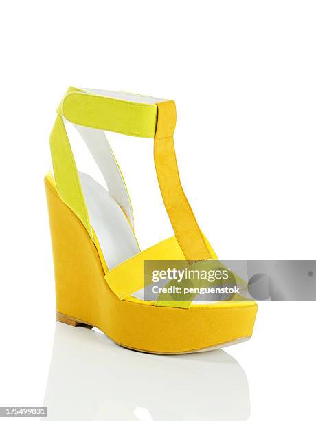 yellow shoe - yellow shoe stock pictures, royalty-free photos & images