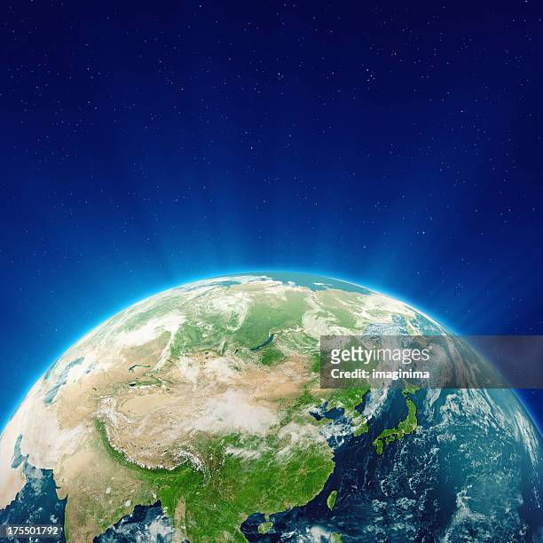 glowing blue earth china, japan and far east - china east asia stock pictures, royalty-free photos & images