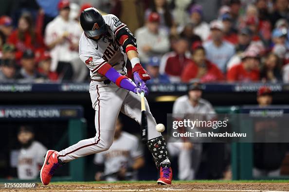 Wv Diamondbacks Lourdes Gurriel Jr. #12 of the Arizona Diamondbacks hits a single ...