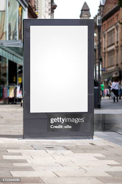 blank advertising billboard in the city center - vertical billboard stock pictures, royalty-free photos & images