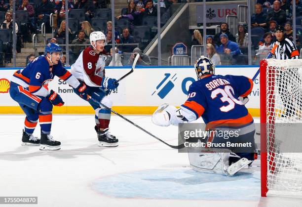 Cale Makar of the Colorado Avalanche scores a first period goal against Ilya Sorokin of the New York Islanders at UBS Arena on October 24, 2023 in...