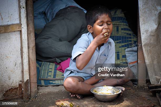 rural boy - hungry stock pictures, royalty-free photos & images