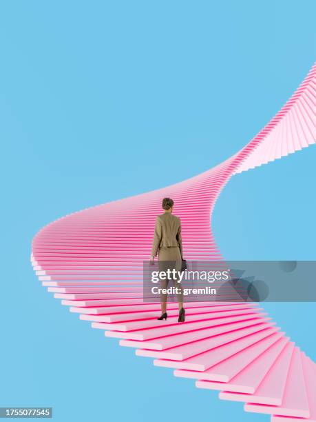 mujer de negocios subiendo las escaleras abstractas - la escalera del éxito fotografías e imágenes de stock