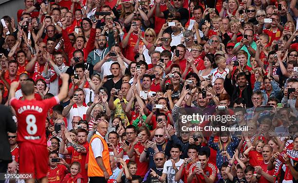 Steven Gerrard of Liverpool on his lap of honour for the fans after the Steven Gerrard Testimonial Match between Liverpool and Olympiacos at Anfield...