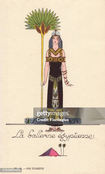 Woman in Egyptian dancer costume, with dress decorated with hieroglyphs, palm fan and sandals. Lithograph by unknown artist with pochoir stencil...