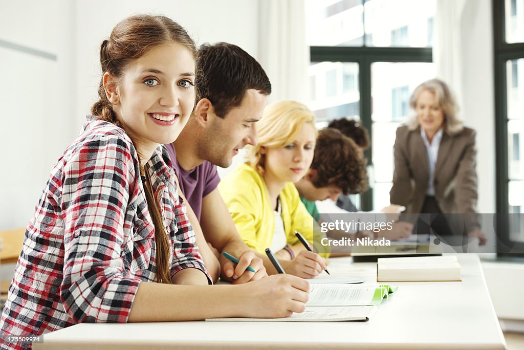 Student Class Assignment Students Completing Assignments In Classroom High-Res Stock Photo ...