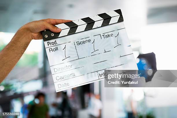 director's film slate showing roll 1, scene 1 and take 1 - directors clapperboard stock pictures, royalty-free photos & images