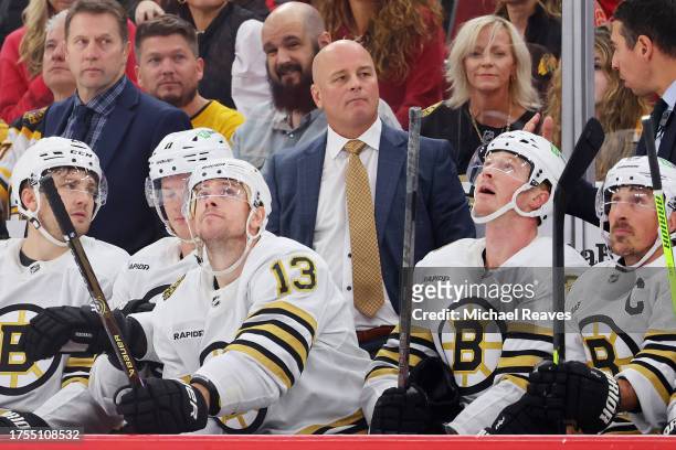 Head coach Jim Montgomery of the Boston Bruins looks on against the Chicago Blackhawks during the first period at the United Center on October 24,...