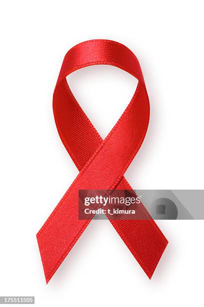 red ribbon - aids awareness ribbon stock pictures, royalty-free photos & images