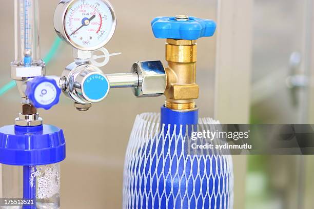 a blue medical oxygen concentrator - oxygen cylinder stock pictures, royalty-free photos & images