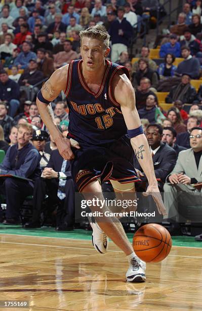 Chris Andersen of the Denver Nuggets drives to the basket during the game against the Boston Celtics at Fleet Center on January 24, 2003 in Boston,...