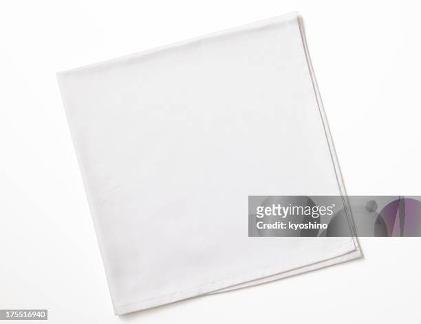 isolato colpo di piegato bianco tovagliolo su sfondo bianco - materiale tessile foto e immagini stock