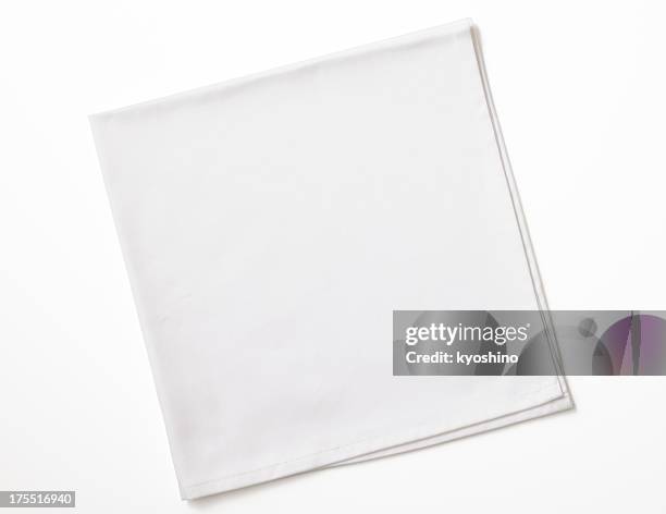 isolated shot of folded white napkin on white background - textiel stockfoto's en -beelden